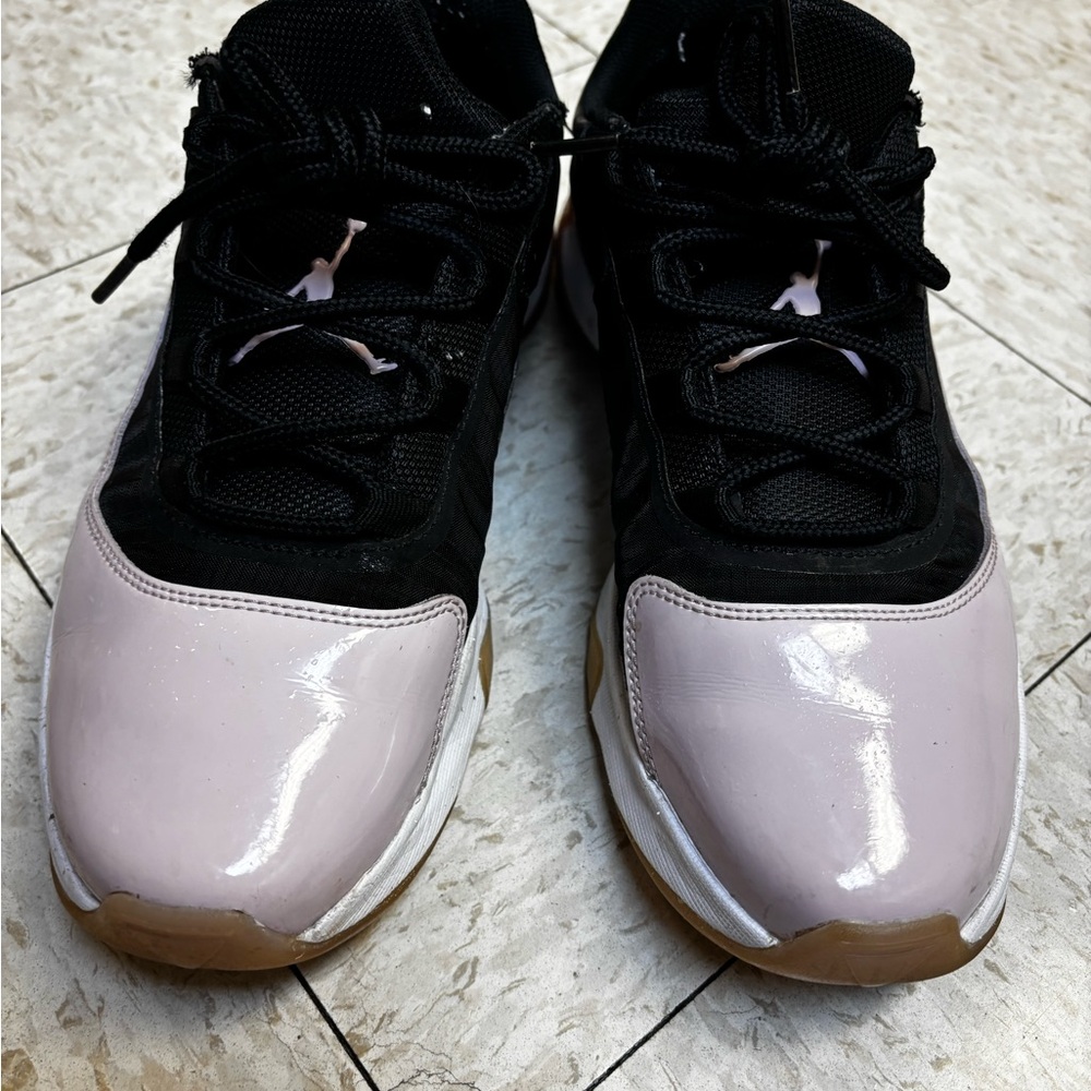 Black and Light Purple Jordan 11s